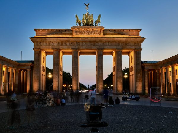 a large building with Brandenburg Gate in the background