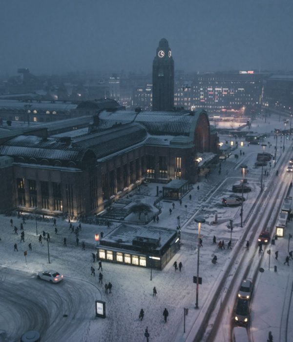 aerial photography of street at night covered with snow